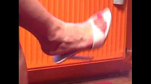 Mature feet in mules tease scene