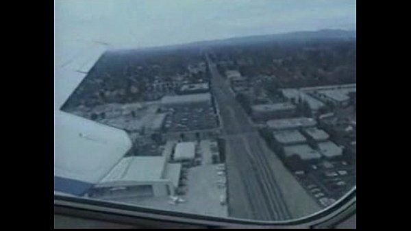 Mother and daughter in plane scene