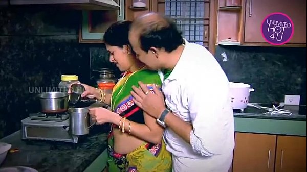 Sister teaches brother kitchen scene